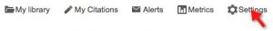 A screenshot of the top of the Google Scholar hompage. An arrow points to the "Settings" icon (a cogwheel).