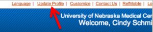A screenshot of the upper right-hand corner of a RefWorks account's webpage. The welcome message is shown. An arrow points to the "Update profile" link above this "welcome" message.